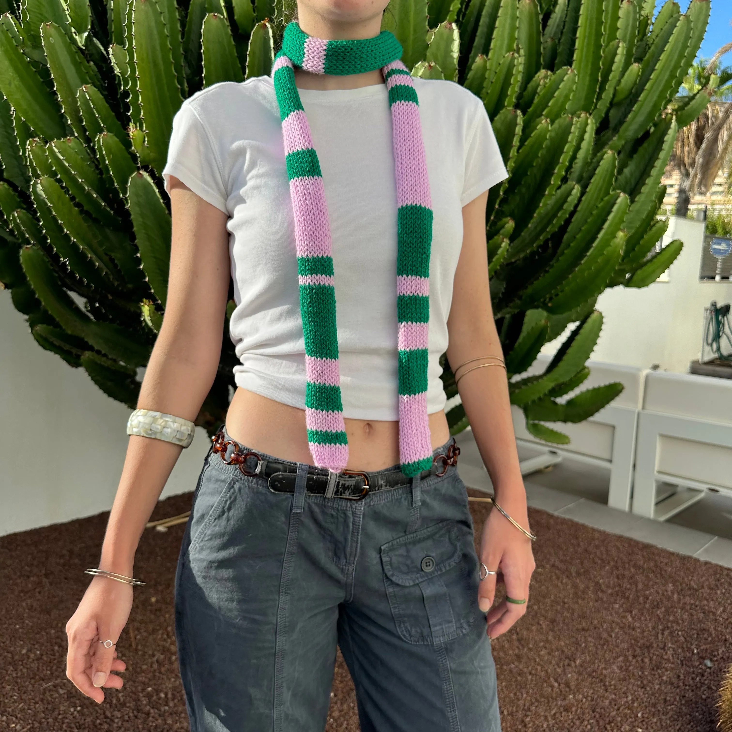 Handmade knitted stripy skinny scarf in baby pink and green