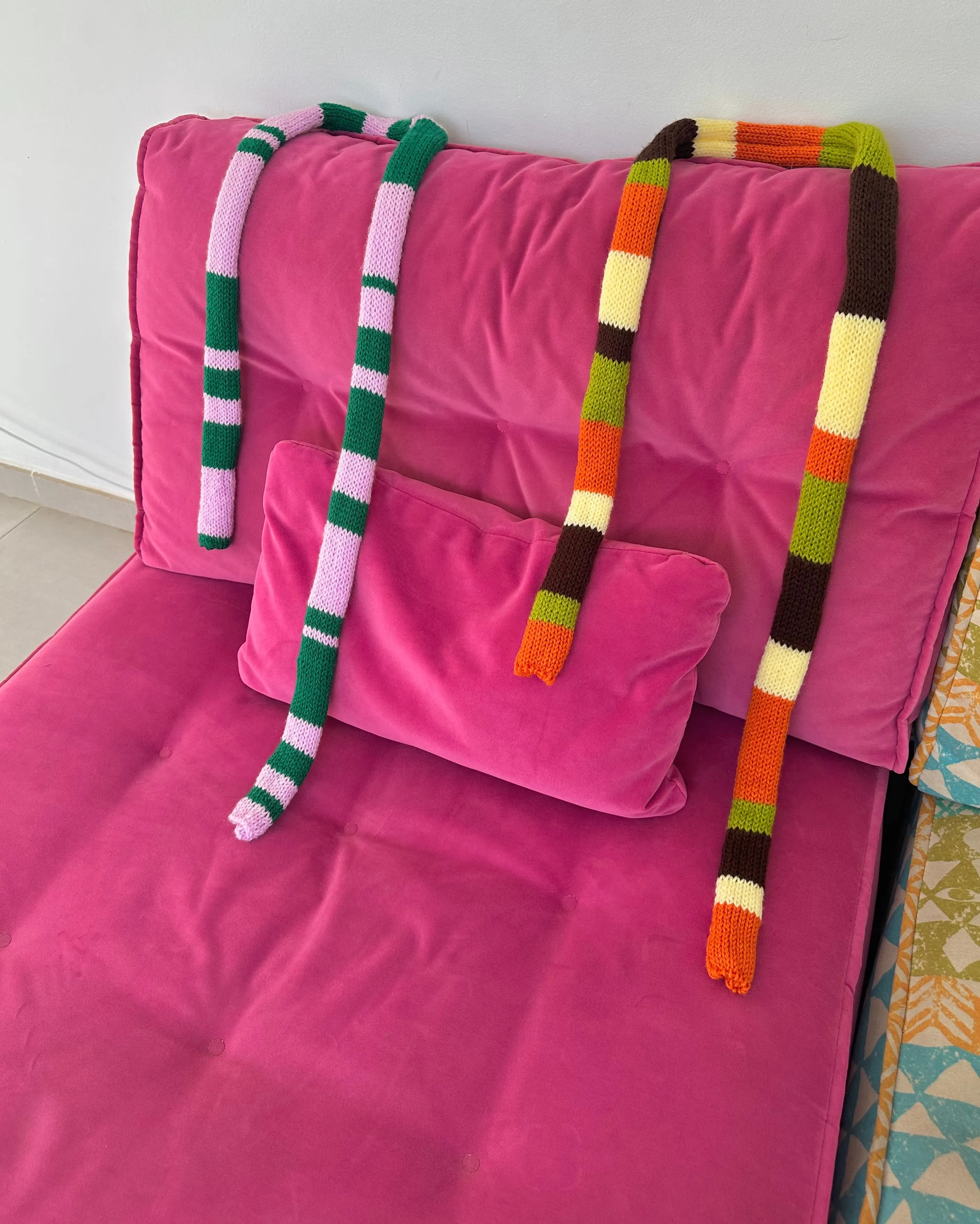 Handmade knitted stripy skinny scarf in baby pink and green