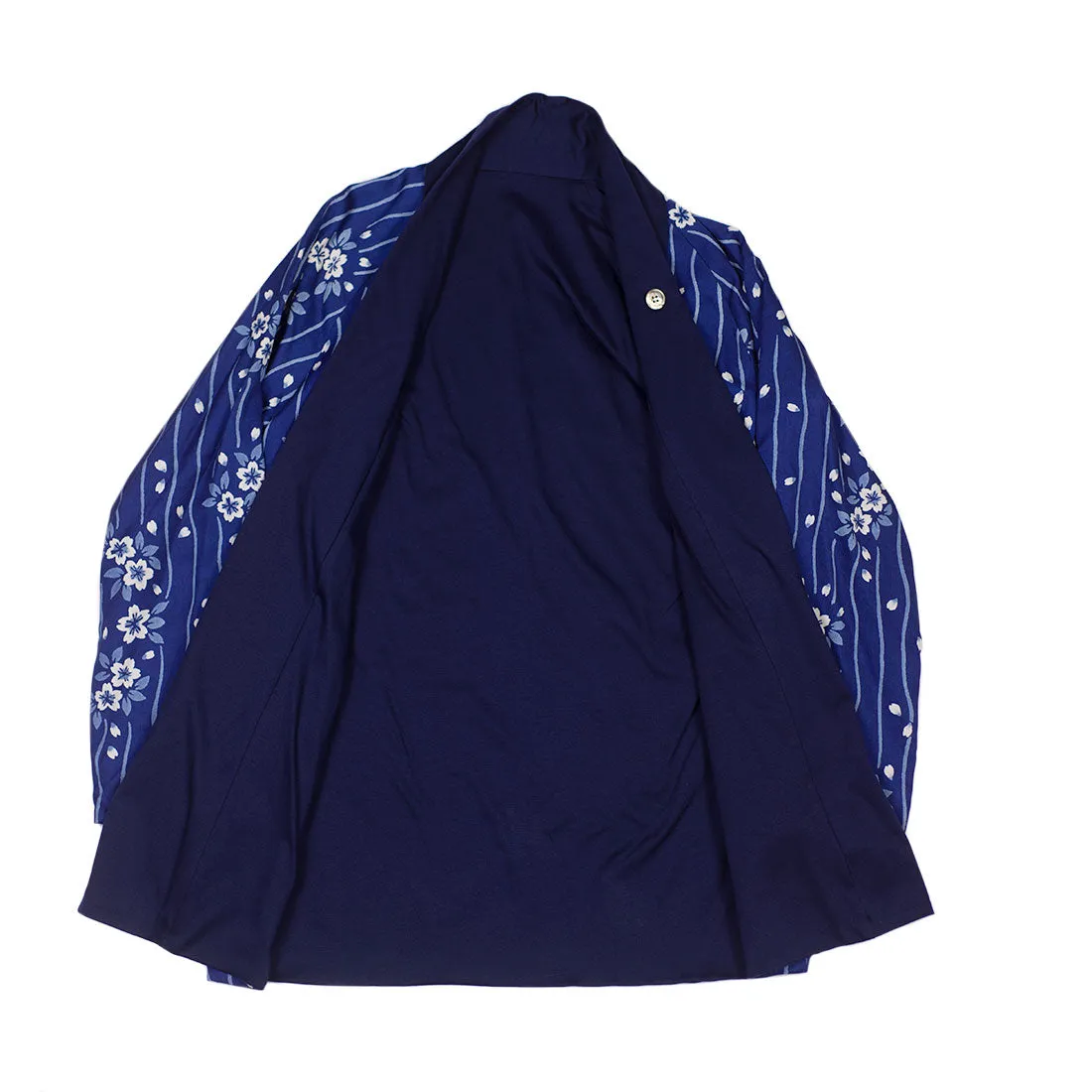 Reversible indigo cotton and lyocell kimono jacket with "flower raft" bassen relief print