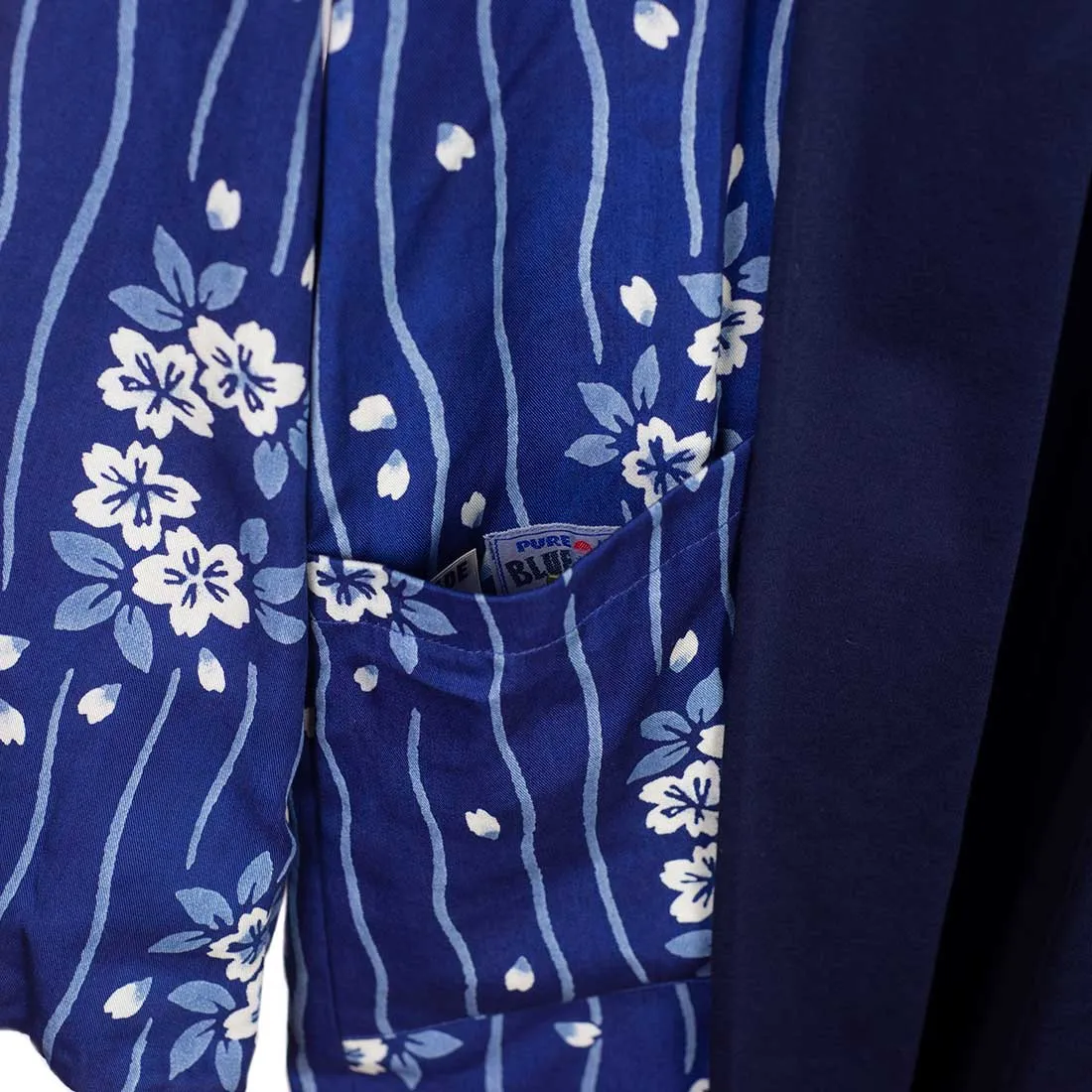 Reversible indigo cotton and lyocell kimono jacket with "flower raft" bassen relief print